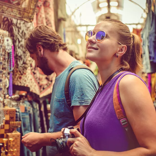 Couple shopping while traveling