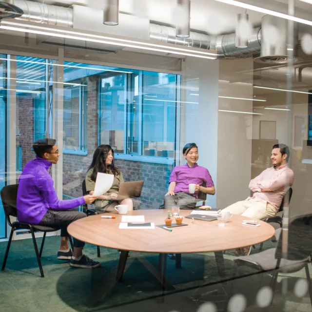 People working in conference room