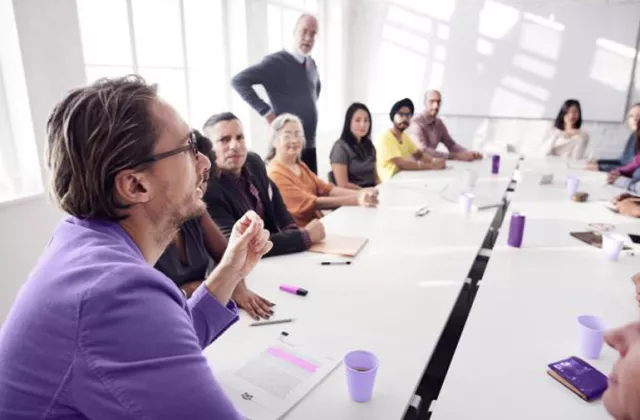 man presenting at meeting