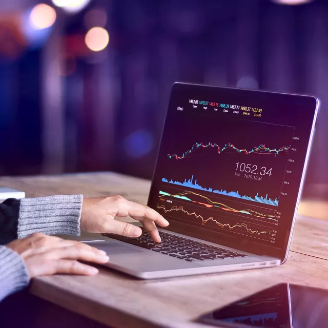 Image of hands working on laptop