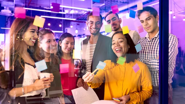 Image of people celebrating in the office