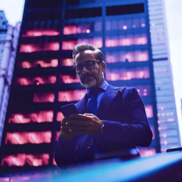 Image of man on mobile phone outdoors