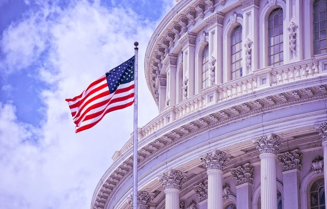 Image of the US flag in the White House.