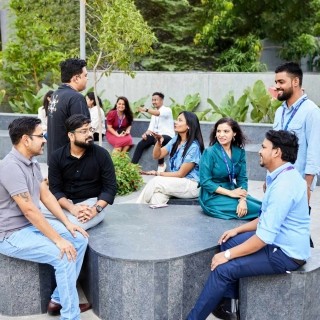 Image of officemates talking outside