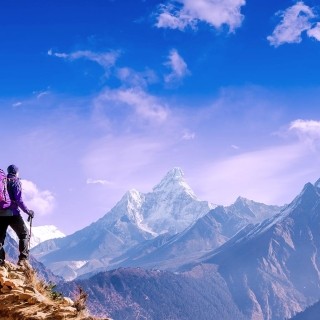 Image of a man on top of the mountains