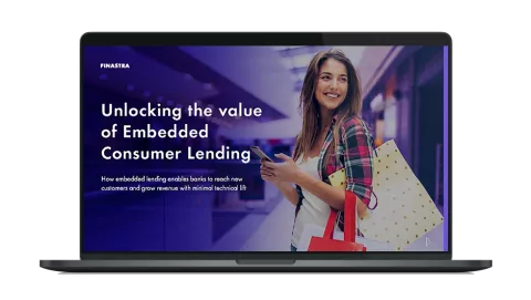 Image of laptop with cover slide for "Unlocking the value of Embedded Consumer Lending" white paper