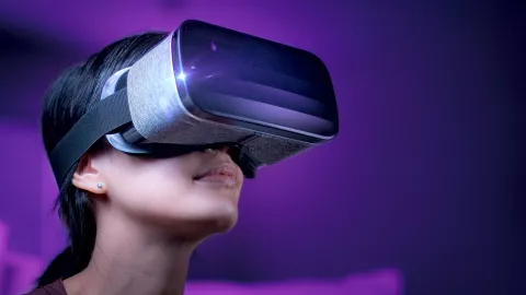 Image of woman wearing virtual reality headset