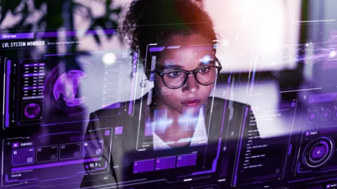 Image of woman working on her laptop