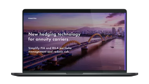 Image of laptop with cover slide for the "New hedging technology for annuity carriers" white paper